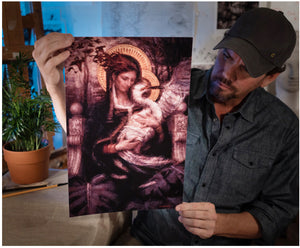 Artist Sean Diediker holds a print of his artwork "The Bird Doctor" available to purchase on CTWgallery.com