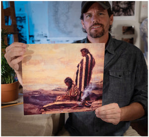 Painter Sean Diediker holds image of The One Who Wait inspired by Utah Canvasing The World television show.